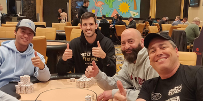 Robbie Sitting at a Poker  Table With Friends